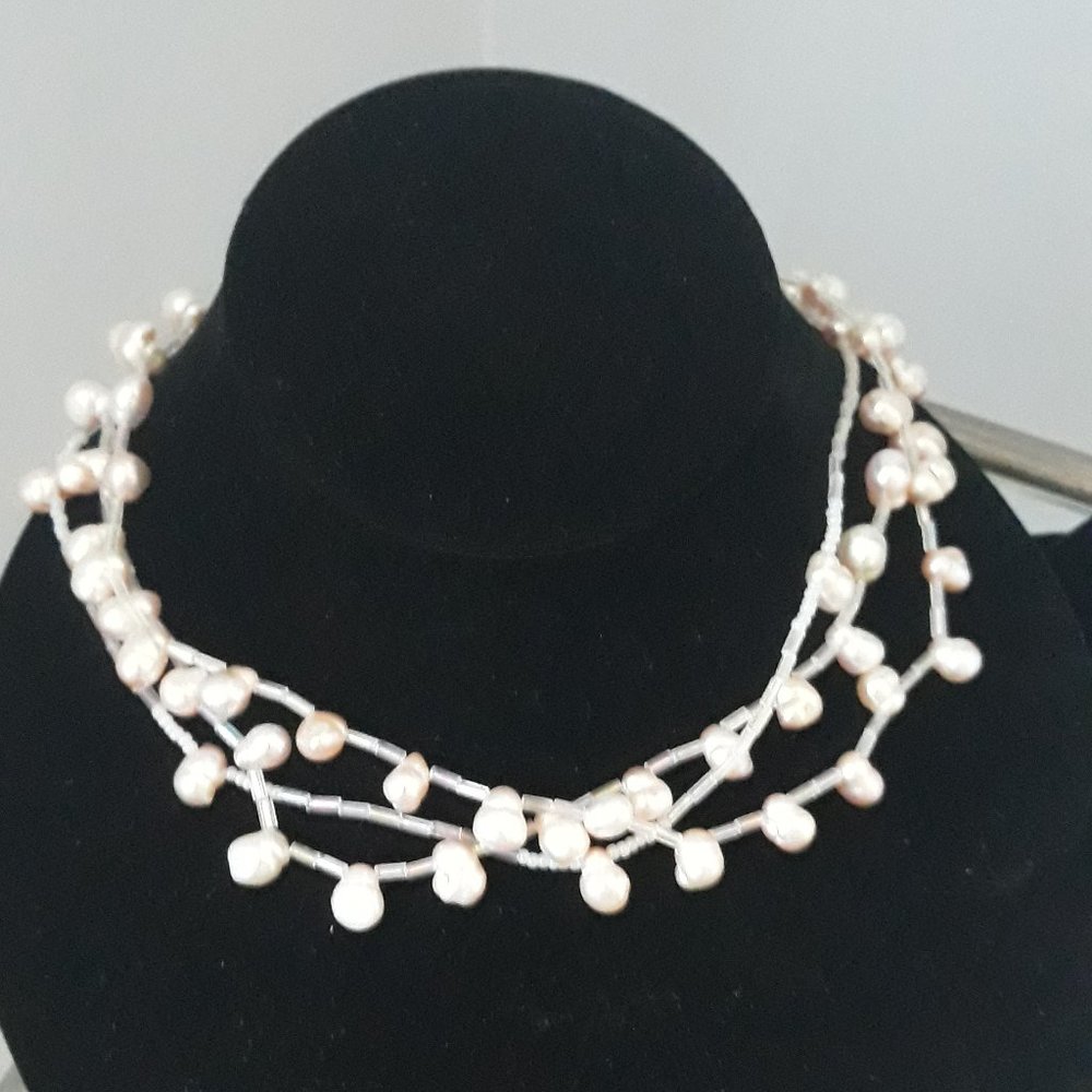 Pale pink pearl choker and earring set.